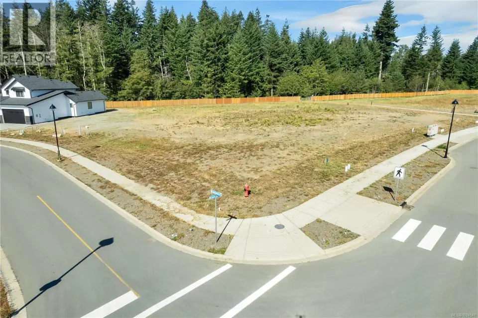 Presenting Lot 10, a fabulous corner duplex lot with southern, sunny backyard exposure. Corner permits two separate driveways, one on each street.