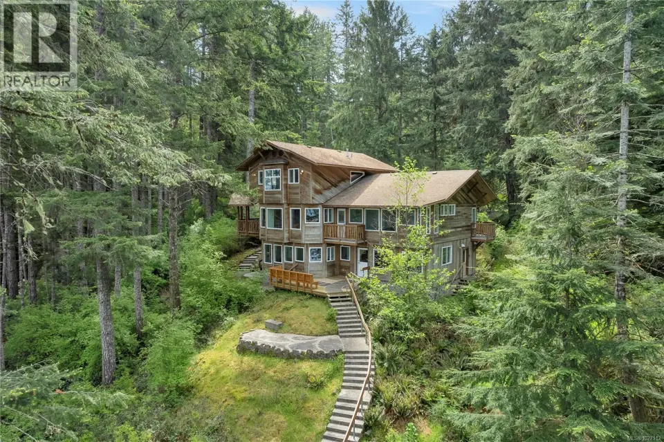 Custom built home on 4.94 acre oceanfront property overlooking Hyacinthe Bay!