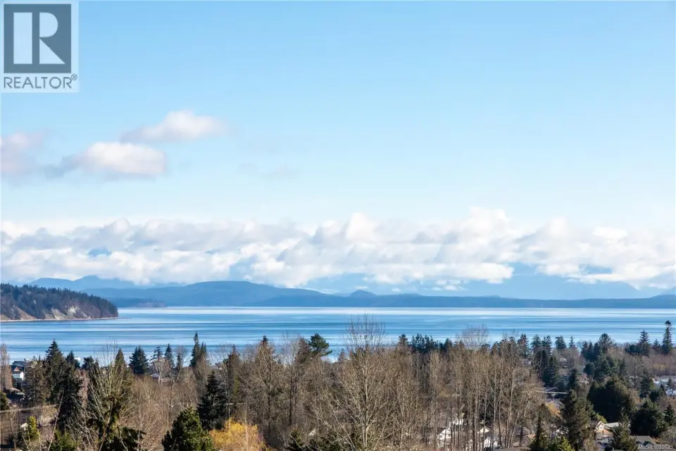 Main level entry, walk out basement building lot with incredible Ocean and Mountain Views.