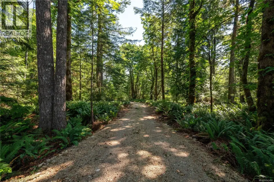 Quadra Island acreage! This 4.35 acre lot is situated in the Fir Crest Acres subdivision, adjacent to the Quadra Island Golf Club.