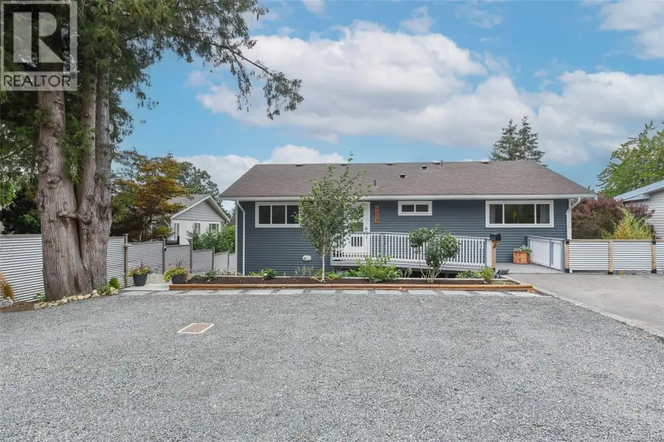 An exceptional East Courtenay property with loads of parking for 6+ vehicles plus RV parking.