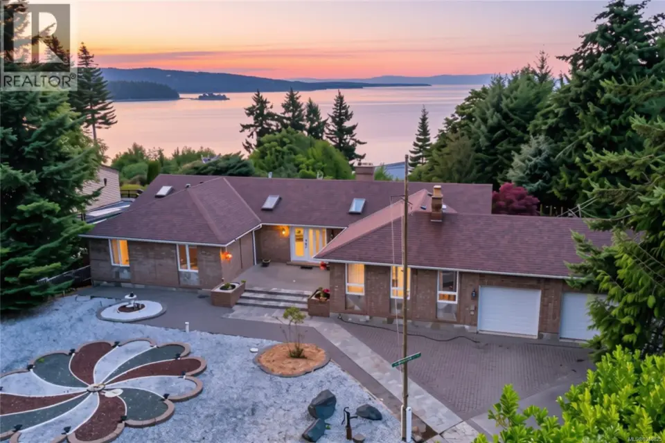 Ocean View 2,243 sq ft, 3-bed, 3-bath Rancher with Guest House in Vancouver Island's Deep Bay community with views of Denman, Hornby and Crome Island's. Situated on a private .53 ac property.