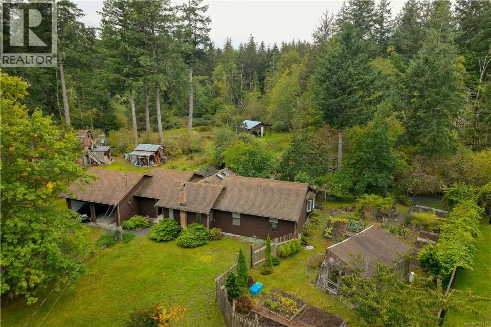 Rancher and shop on peaceful 5 acre property on the east side of Quadra Island!